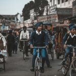 Street life in Amritsar with boys on bicycles and vibrant market activity. punjab board pseb 10th result 2025