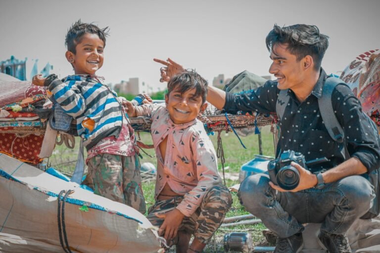Smiling children enjoying a joyful moment outdoors in Bihar, India. A glimpse of happiness and friendship.Pradhan Mantri Awas Yojana (PMAY): A Complete Guide to Affordable Housing in India aaj ki taaja khabar The Pradhan Mantri Awas Yojana